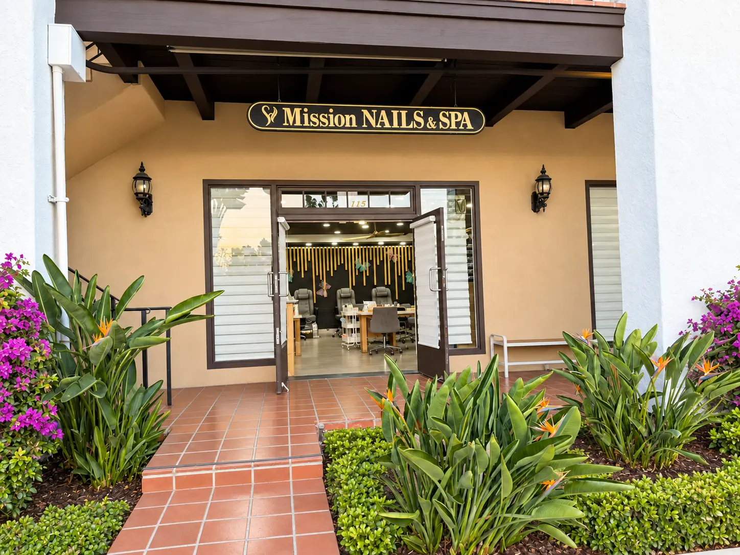 The clean landscaped entrance to Mission Nails and Spa